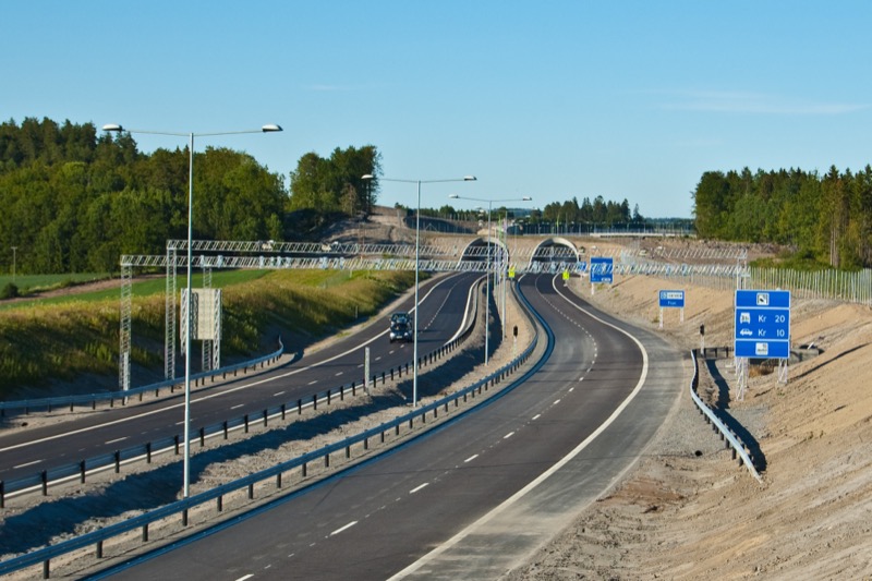 Electronic AutoPASS toll gantry on a Norwegian motorway — no booths, cameras read plates at full speed